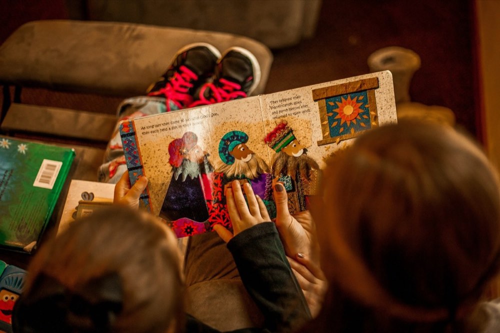 Children reading a picture book together
